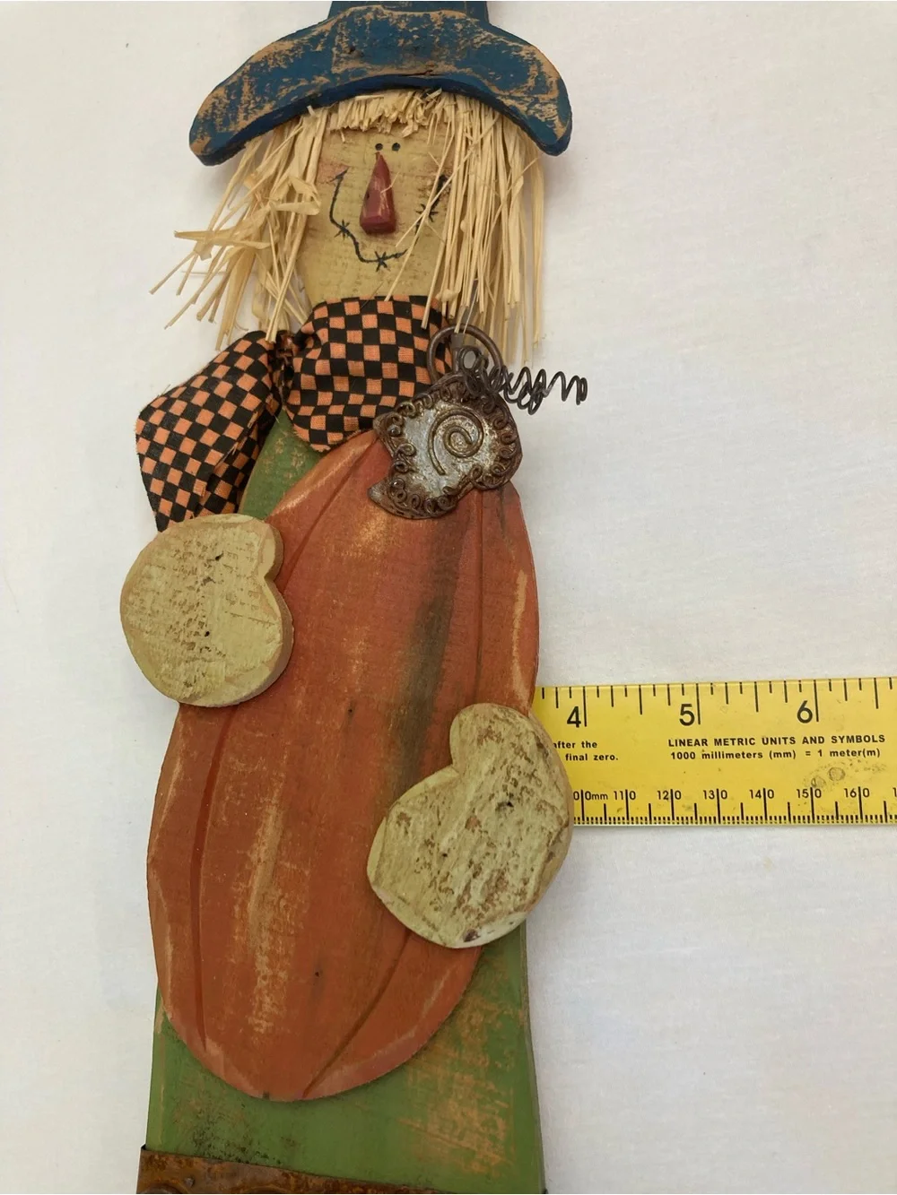 Rustic Wooden Folk Art Scarecrow holding a pumpkin Wall Hanging - used